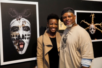 Teddy Mitchener with Mumbi Maina and his picture of her mask. Copyright Teddy Mitchener
